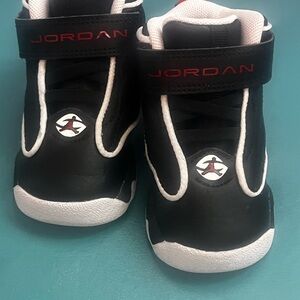 Jordan Kids Black and White Sneakers with Red Highlights
